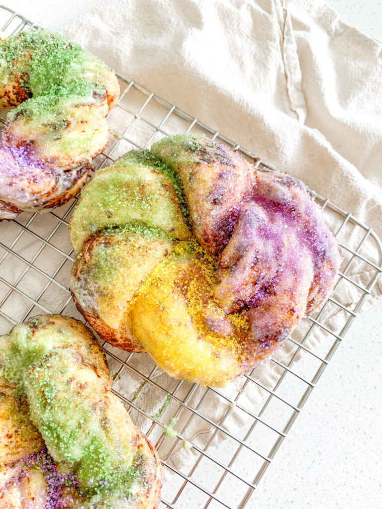 baked and decorated mini sourdough king cakes