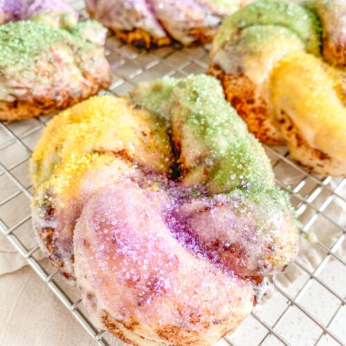 baked and decorated mini sourdough king cakes