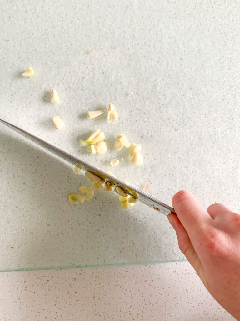 chopping fresh garlic