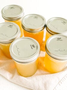 freshly cooked slow cooker chicken stock with rotisserie chicken