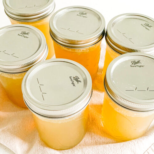 freshly cooked slow cooker chicken stock with rotisserie chicken