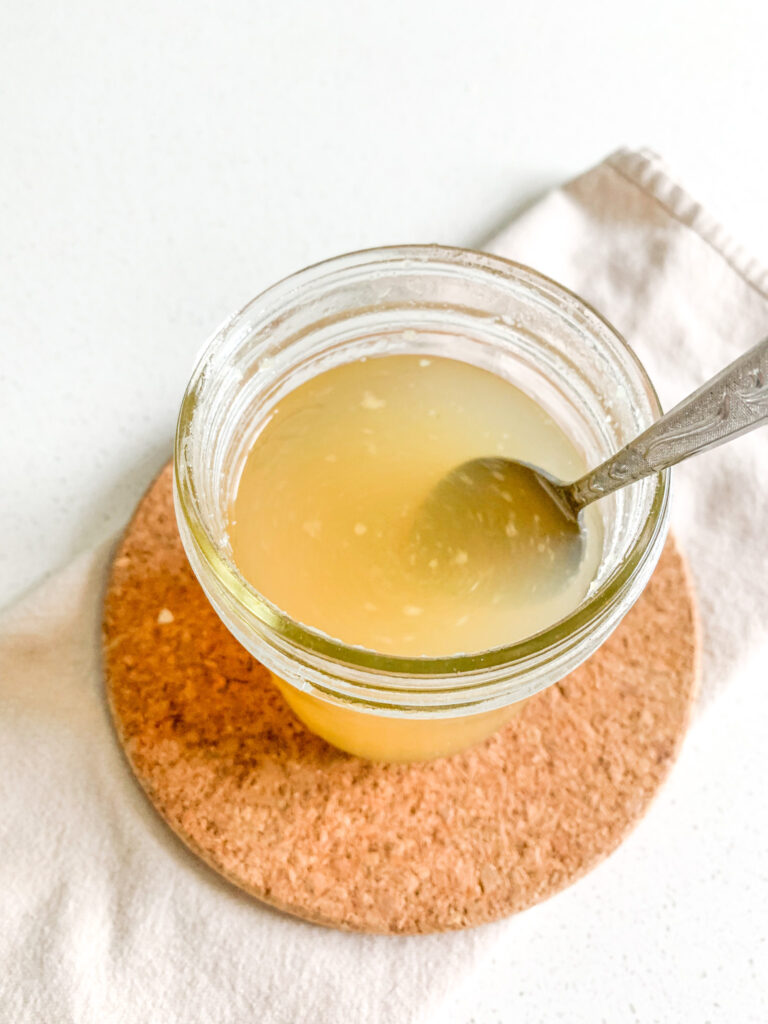 freshly cooked slow cooker chicken stock with rotisserie chicken