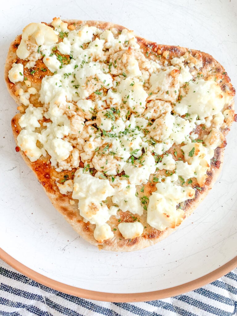freshly baked feta naan pizza