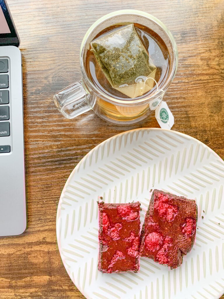 serving sourdough raspberry brownies with mint tea
