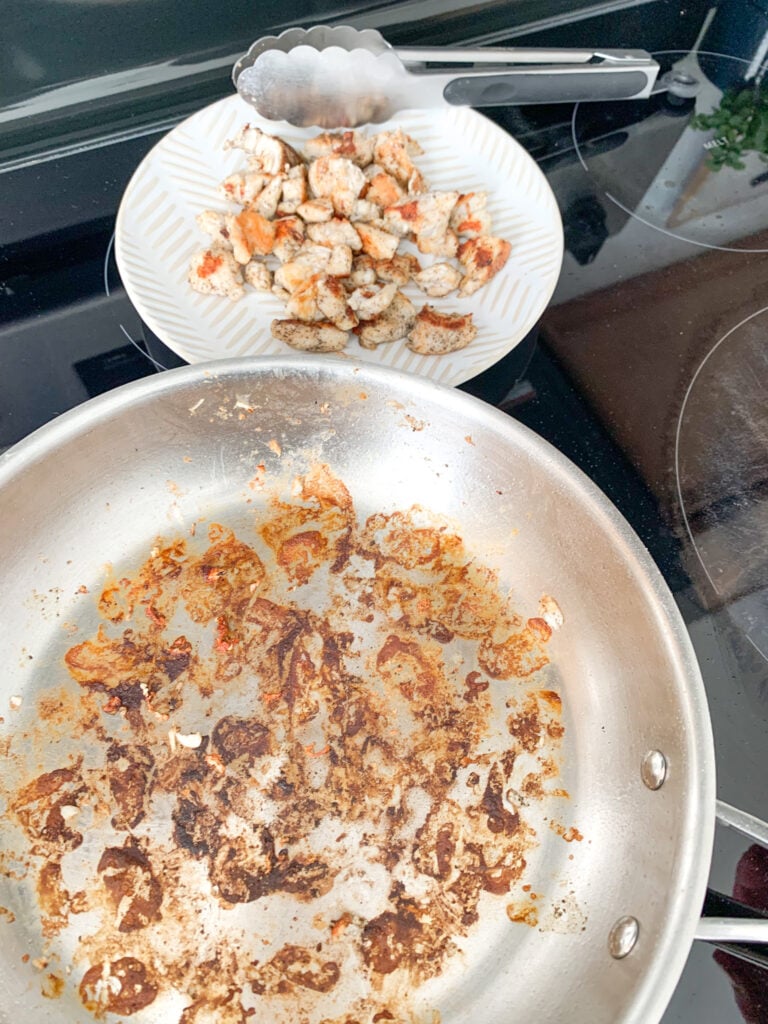 pan seared chicken cooked and placed on a plate