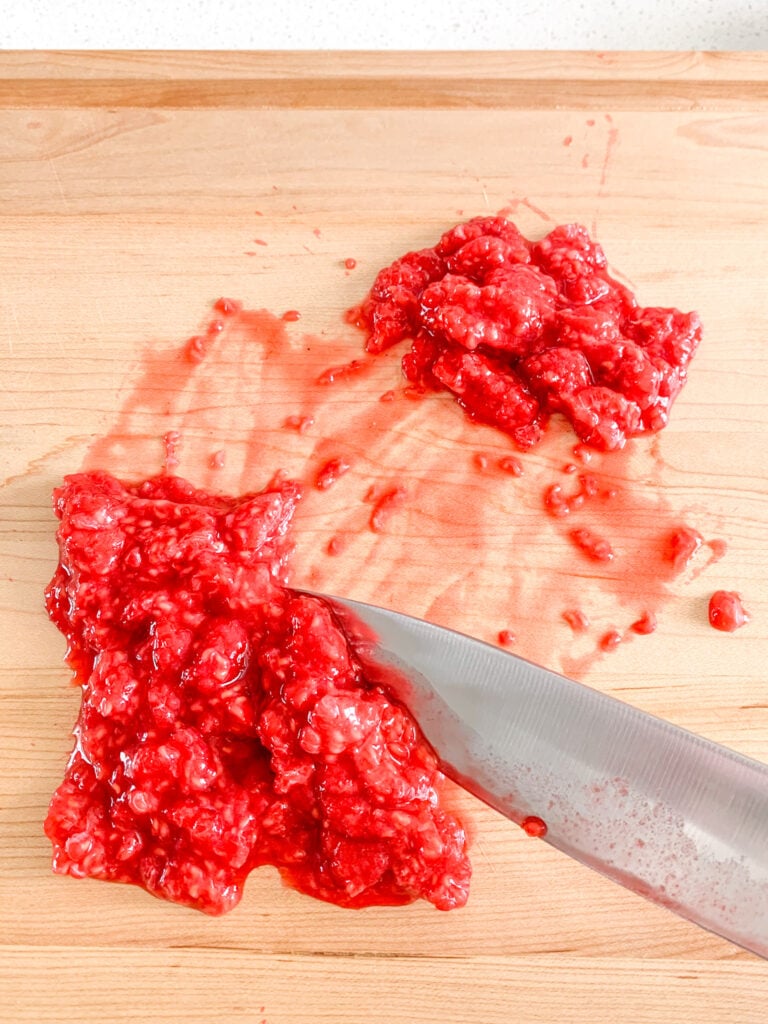 chopping raspberries for brownies