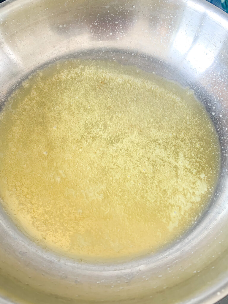 melted butter in skillet for mac and cheese sauce
