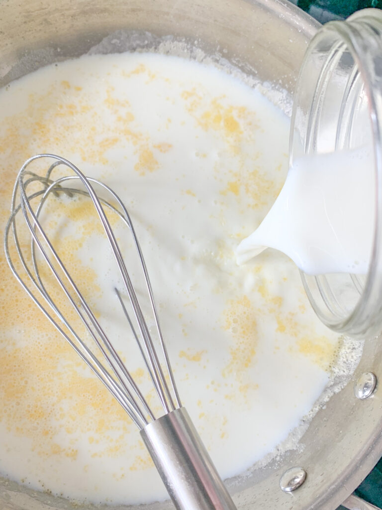 whisking in milk to roux for mac and cheese sauce