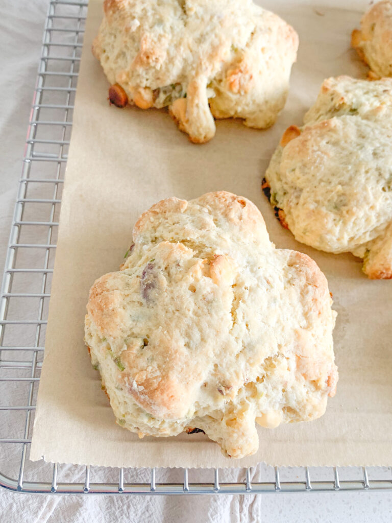 freshly baked white chocolate pistachio sourdough shamrock scones for Saint Patrick's Day