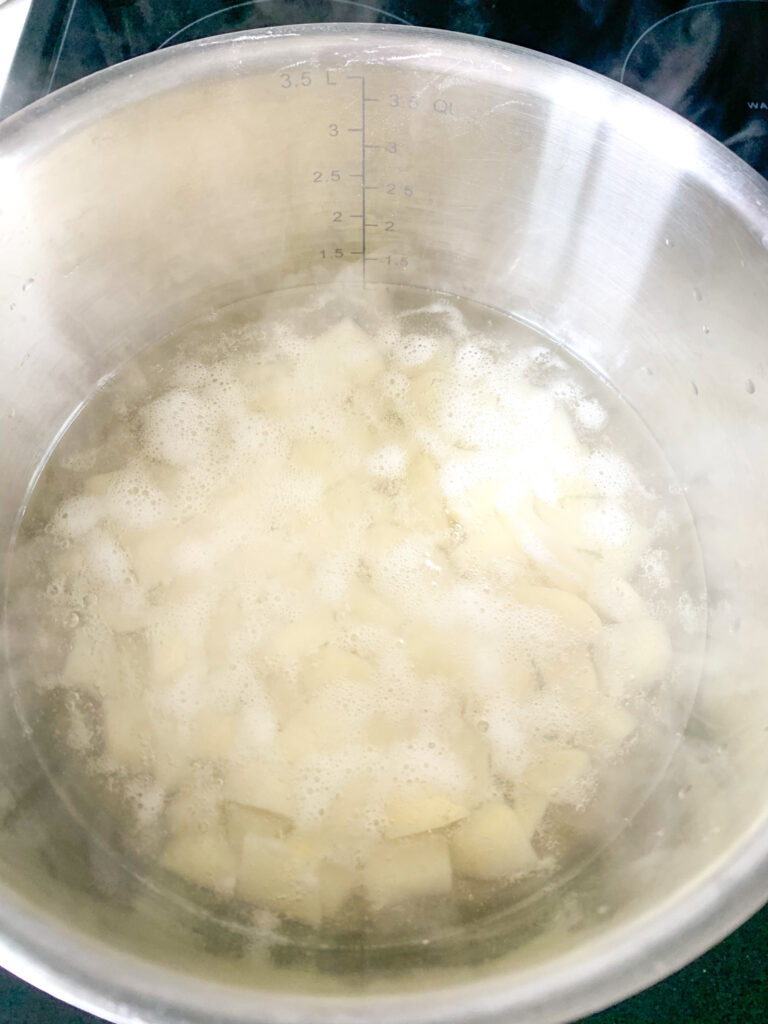 potatoes coming to a boil in a pot