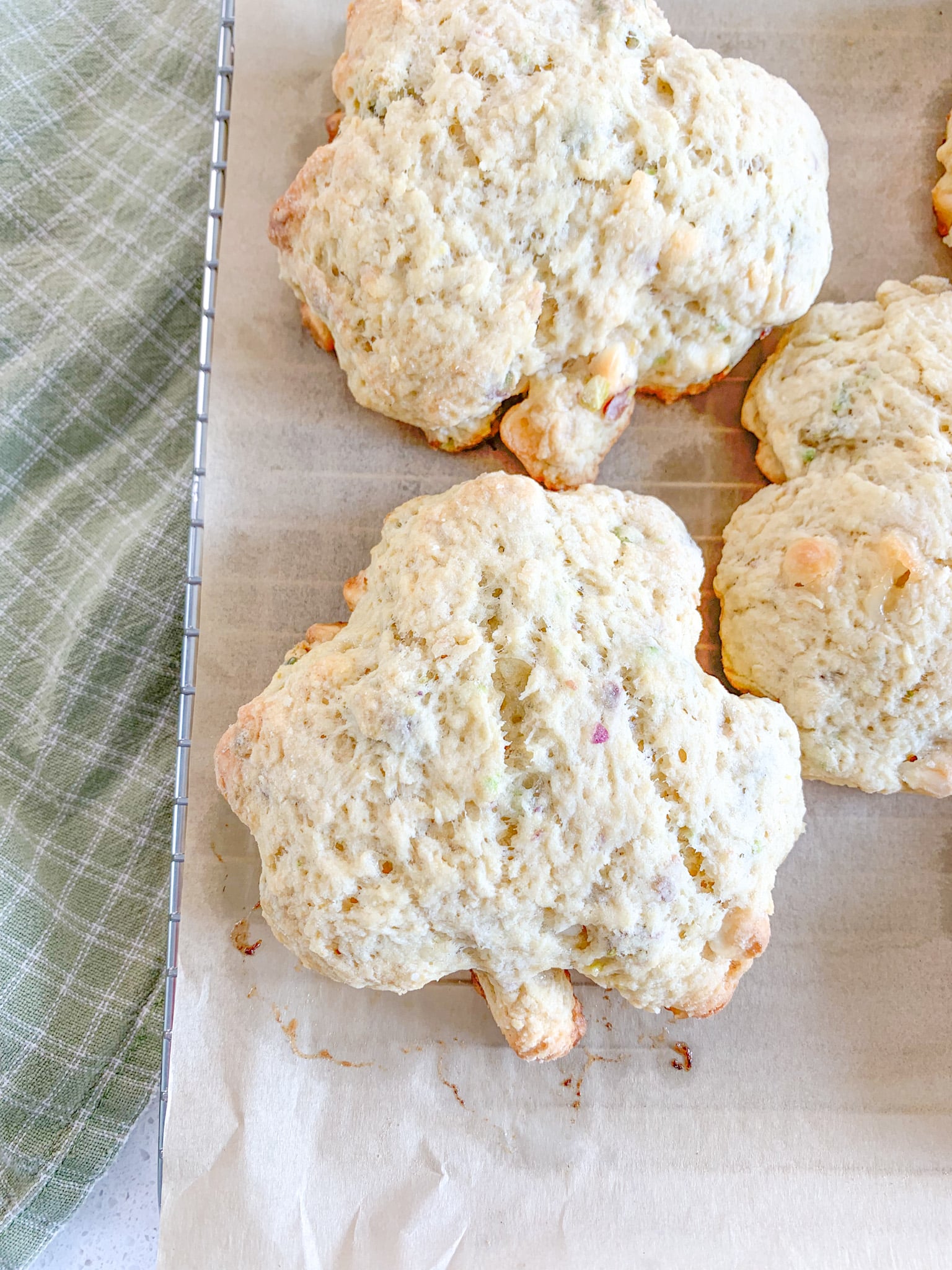 freshly baked white chocolate pistachio sourdough shamrock scones for Saint Patrick's Day