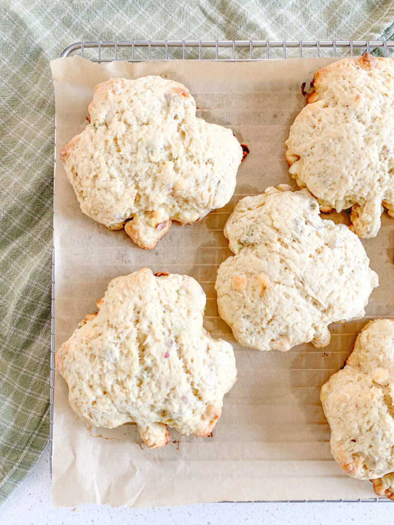 freshly baked white chocolate pistachio sourdough shamrock scones