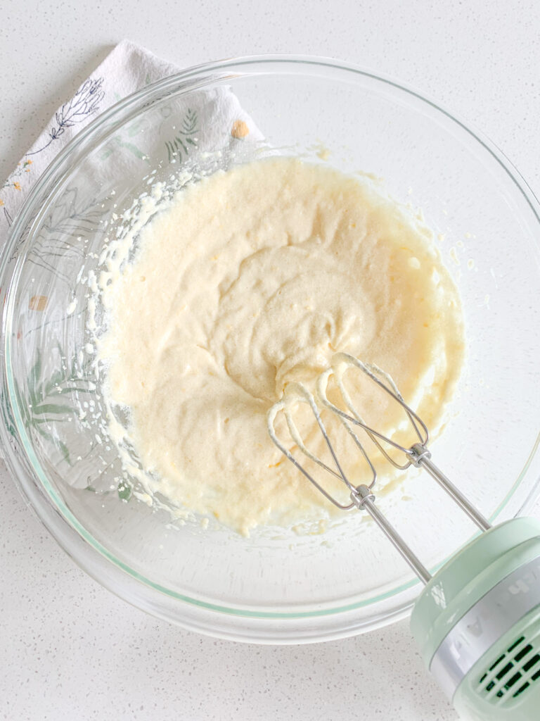 sourdough lemon cookie dough ingredients getting mixed in a bowl