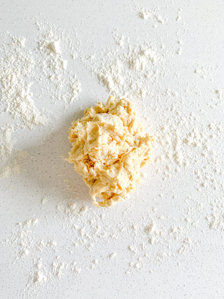 sourdough lemon cookie dough on the counter ready to be rolled