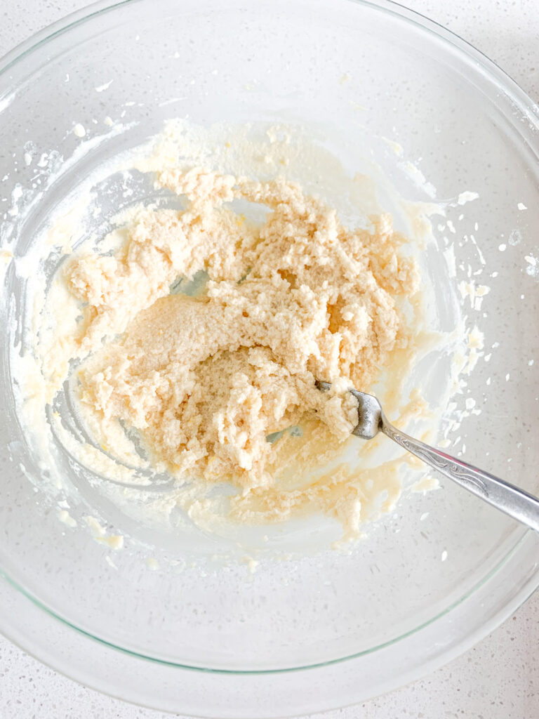 lemon buttercream frosting made from scratch in a mixing bowl