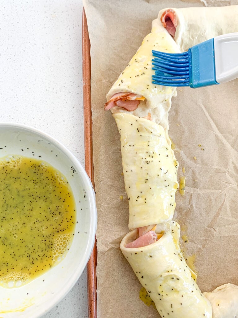 brushing crescent ring with mustard egg wash