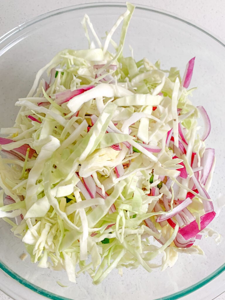 Nashville vinegar slaw veggies in a mixing bowl