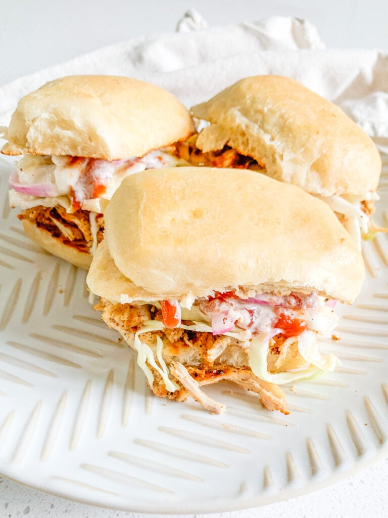 freshly made pulled chicken sliders with Nashville-style vinegar slaw