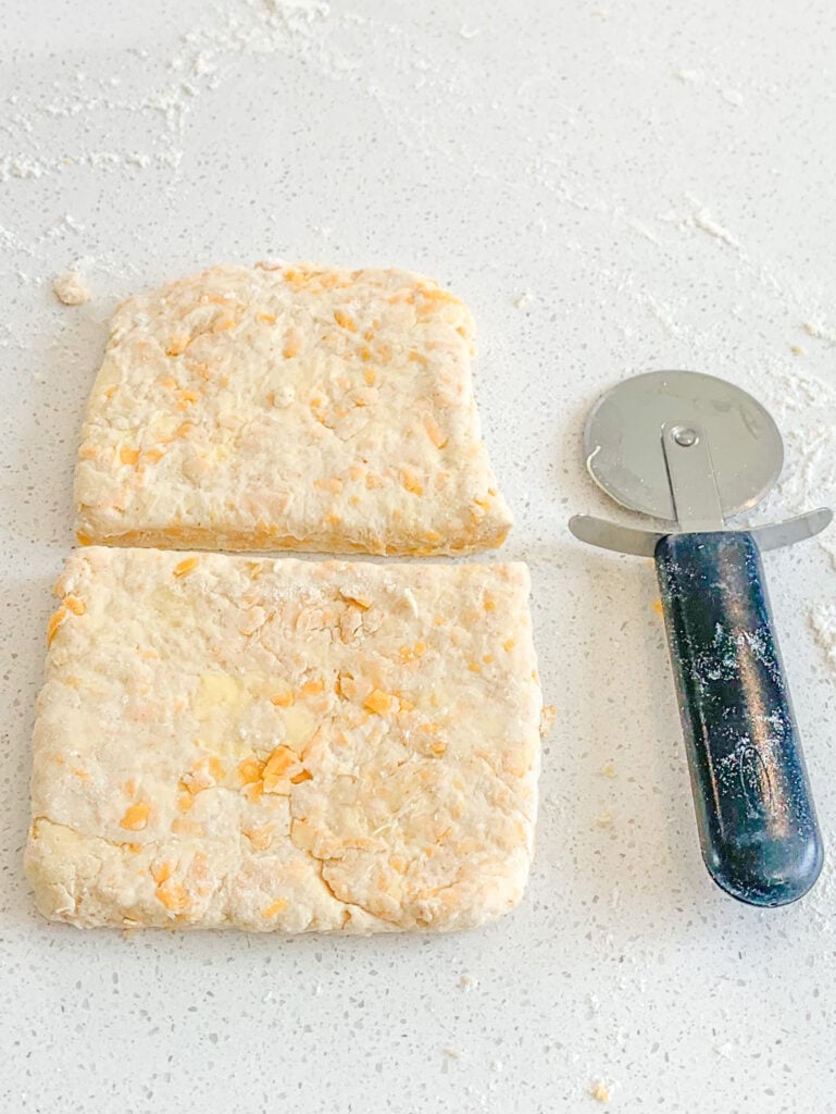 cheese straw dough rolled out and sliced in half