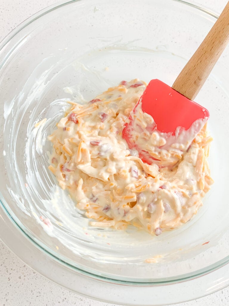 mixing pimento cheese