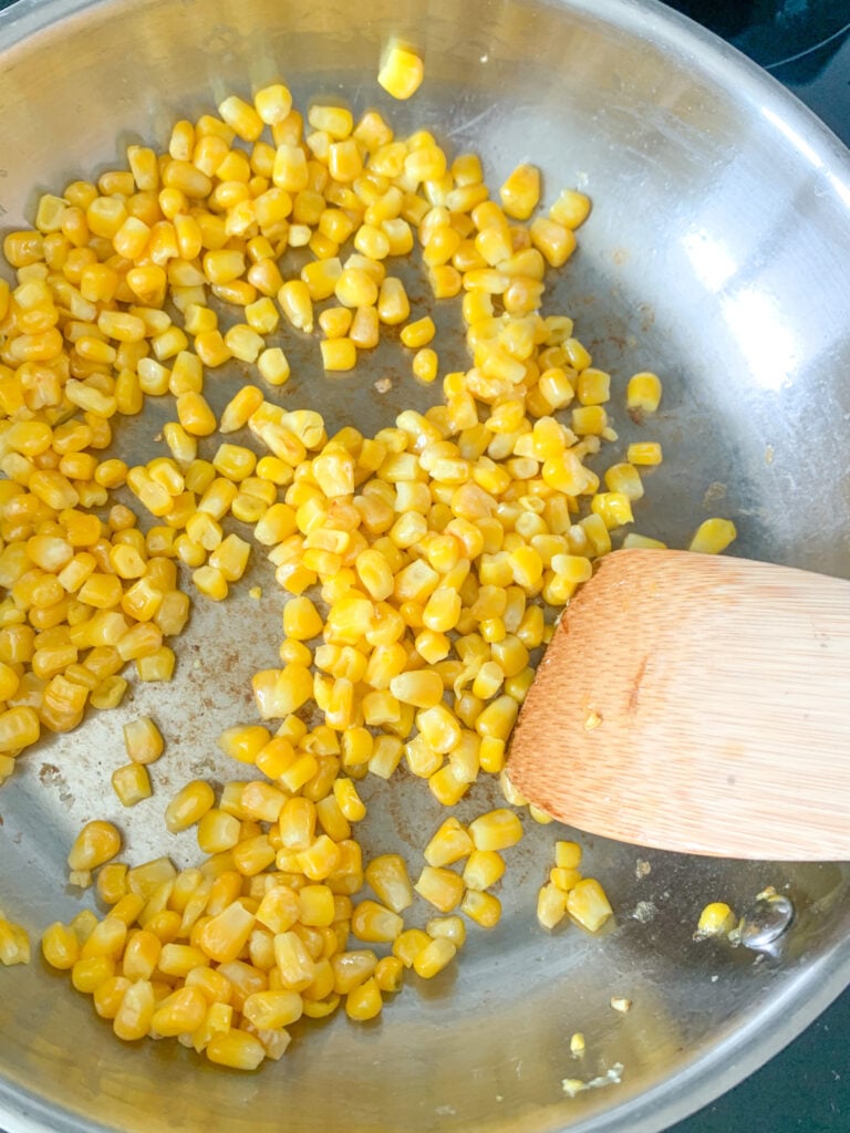 cooking corn in a skillet