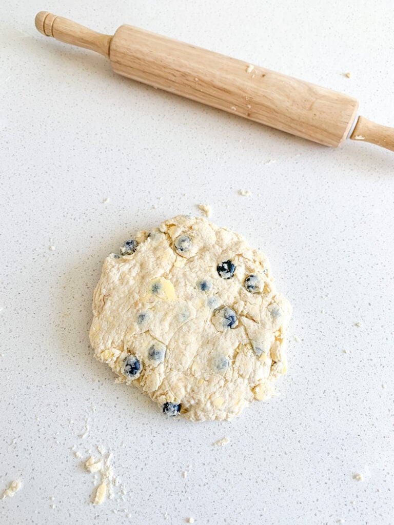 rolled out blueberry biscuit dough