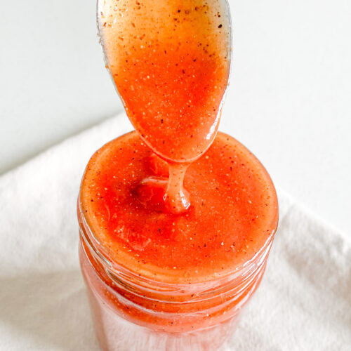 freshly made homemade Tennessee BBQ sauce getting served with a spoon