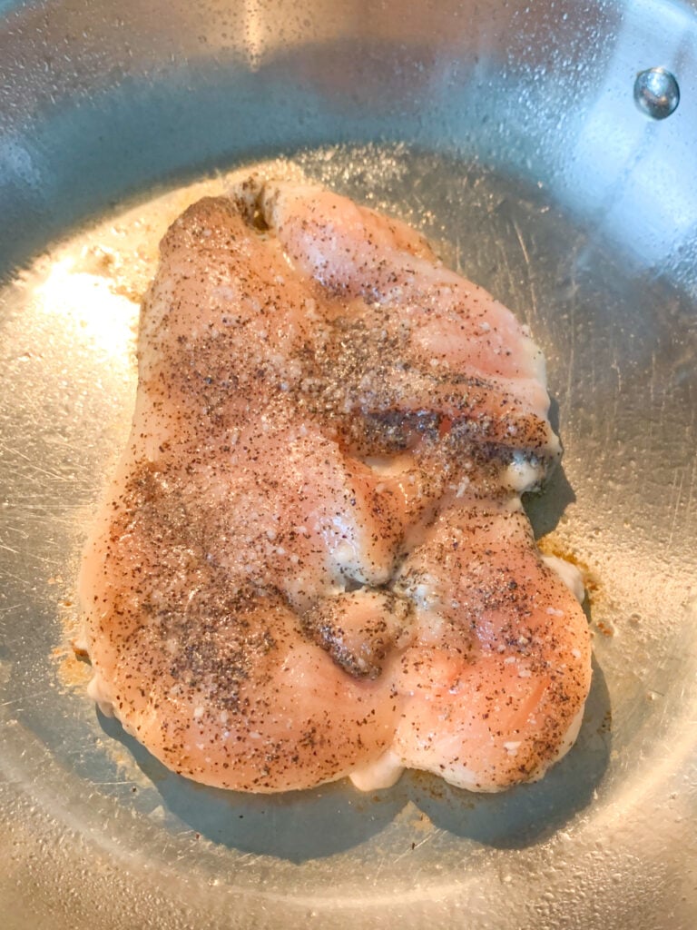 pan searing chicken breast on the stovetop