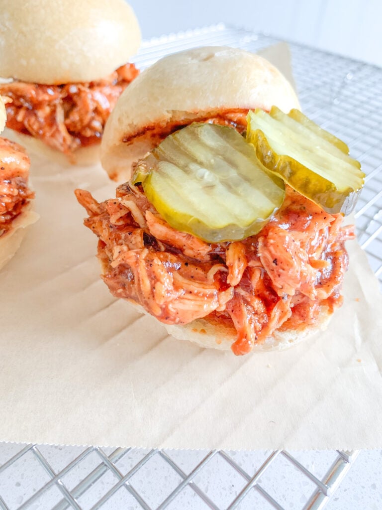 freshly assembled shredded bbq chicken sandwiches