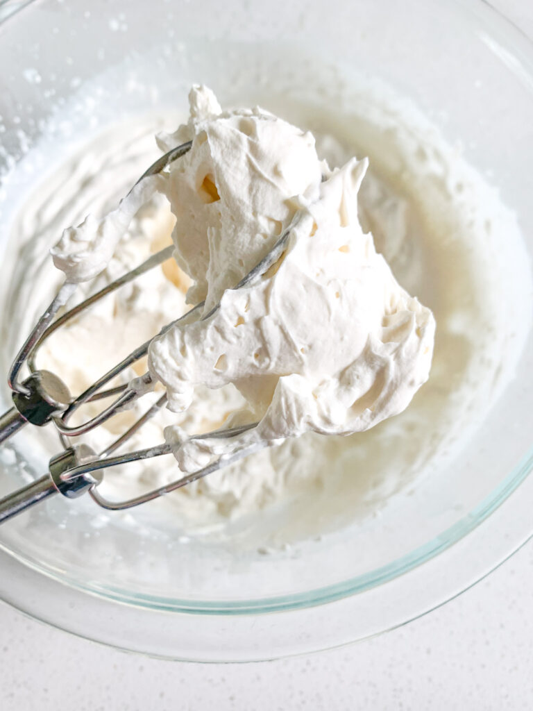 whipped cream frosting whipped to stiff peaks
