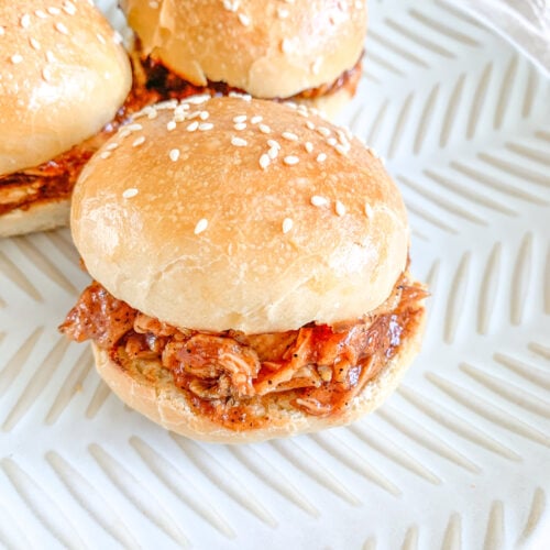 freshly assembled shredded bbq chicken sandwiches