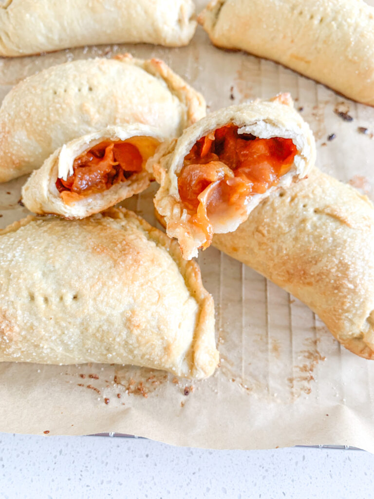 a freshly baked sourdough peach hand pie slip open