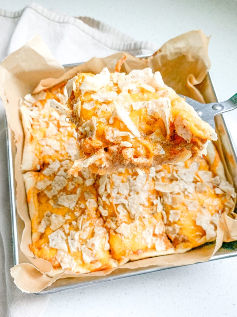 freshly baked sourdough crescent roll taco bake being served