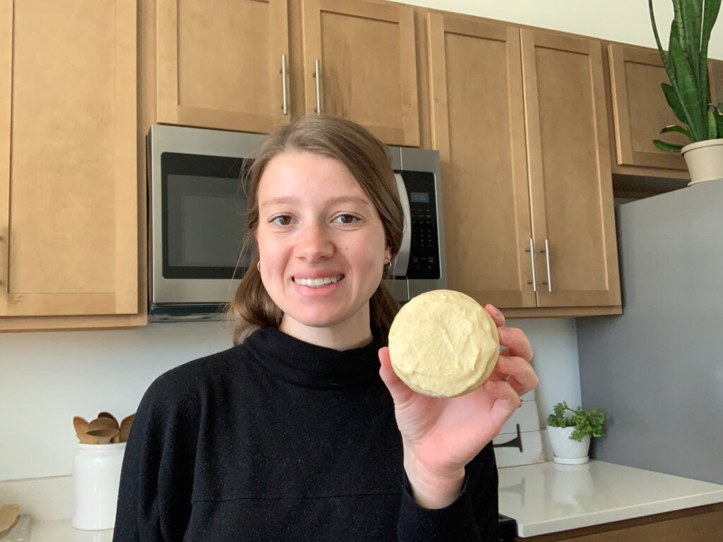 Molly LaFontaine of Plum Branch Home holding her sourdough lemon cookies