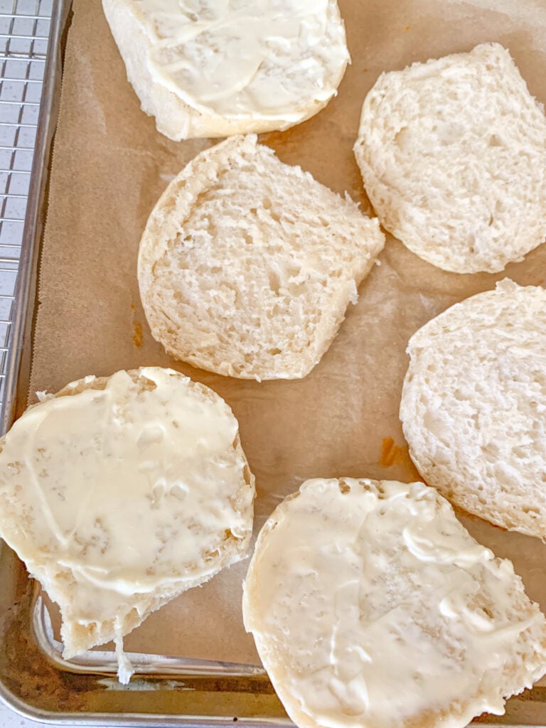 slider buns sliced open and spread with mayo