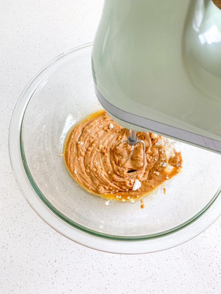 mixing creamy peanut butter filling together for nutter butters