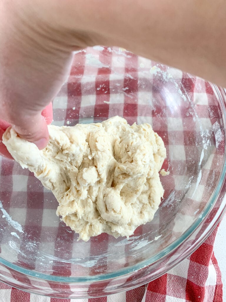 stretch and folding sourdough dough