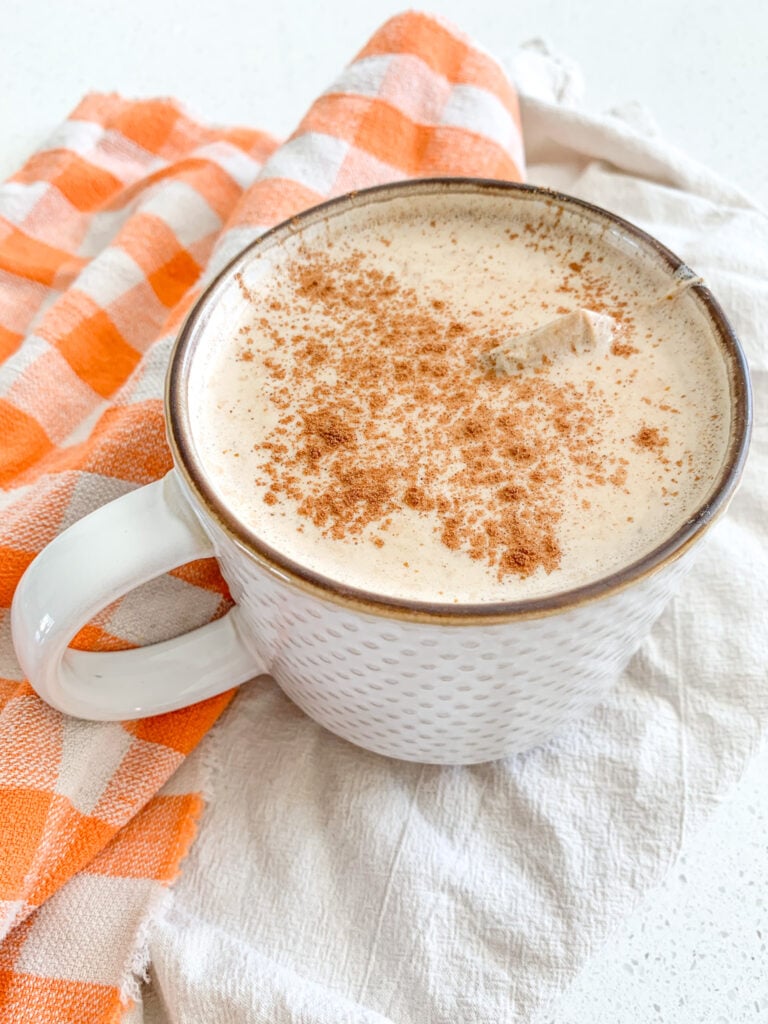 freshly made pumpkin chai latte with cinnamon on top