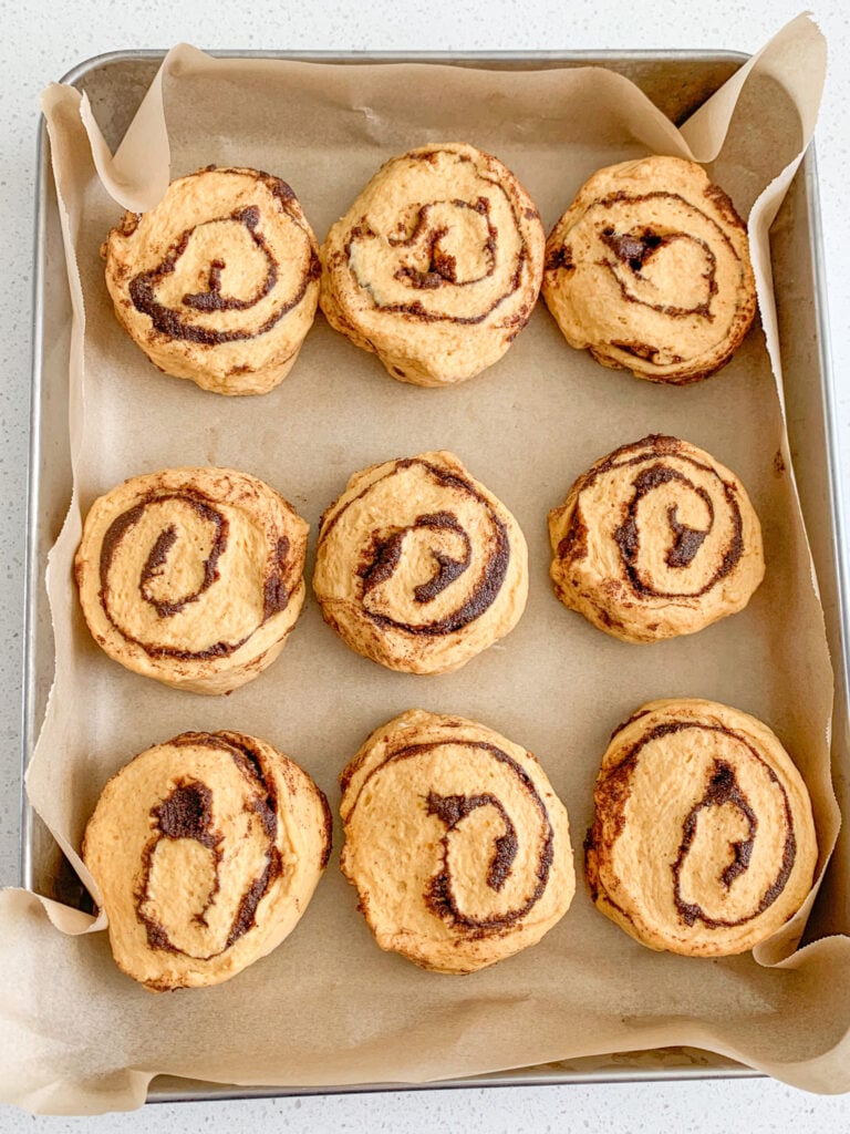 cinnamon rolls shaped and placed in a pan