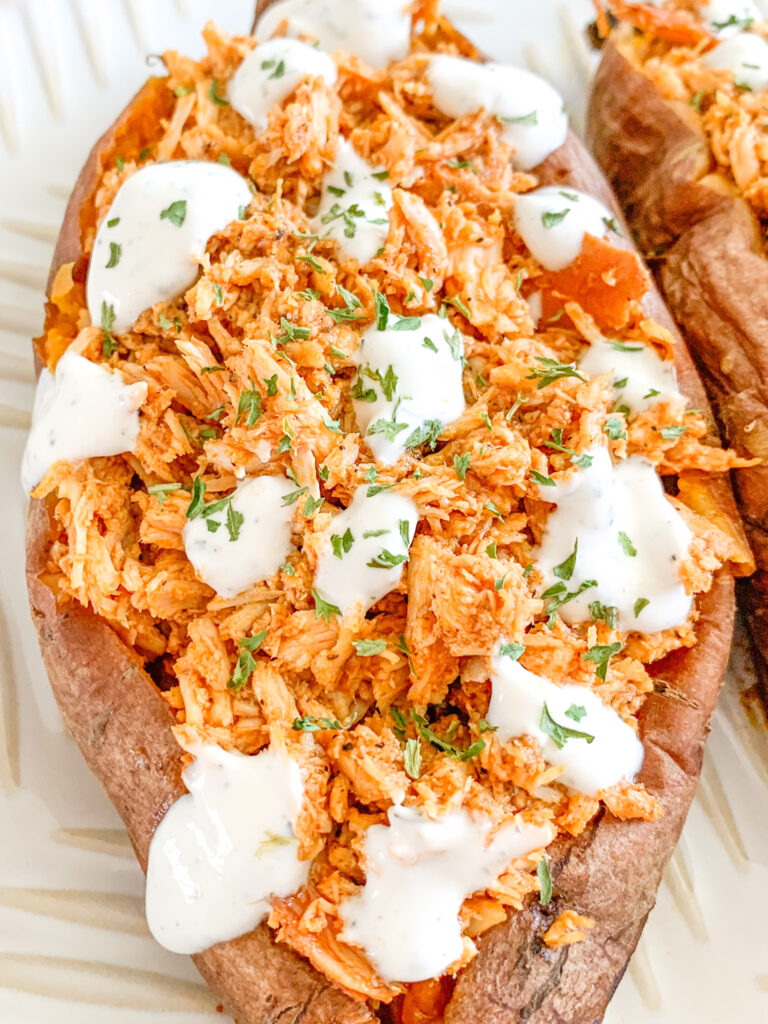 freshly assembled buffalo chicken stuffed sweet potato